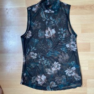 Sleeveless sheer mock neck blouse